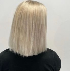 Full bleach, toning and a women's haircut